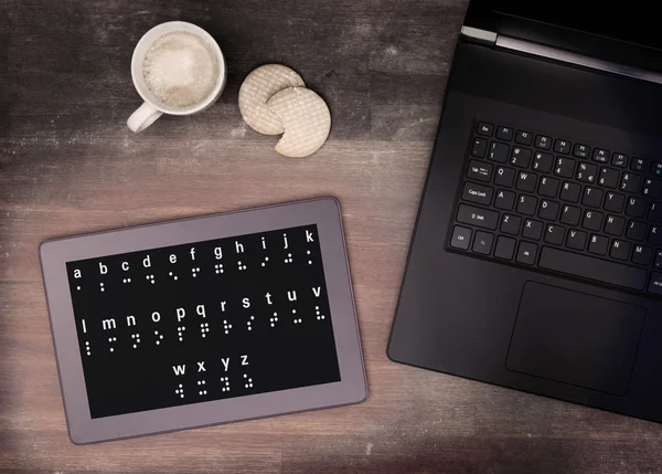 Braille em um tablet, conceito de impossibilidade — Fotografia de Stock