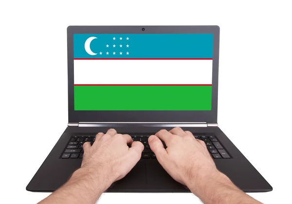 Hands working on laptop, Uzbekistan — Stock Photo, Image