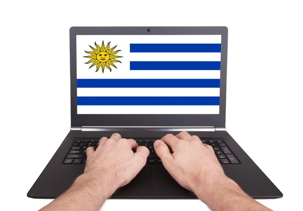 Dizüstü bilgisayar, Uruguay çalışan eller — Stok fotoğraf