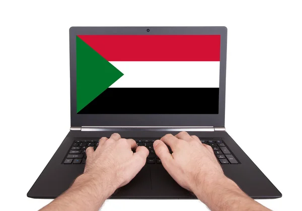 Hands working on laptop, Sudan — Stock Photo, Image