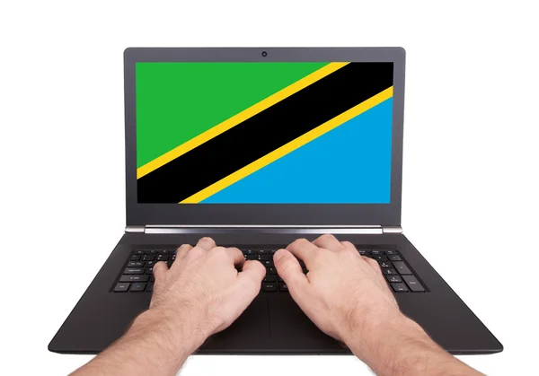 Hands working on laptop, Tanzania — Stock Photo, Image