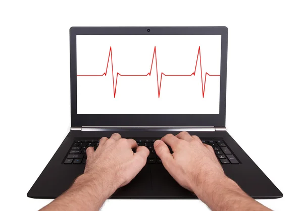 Uomo che lavora su laptop, battito cardiaco — Foto Stock