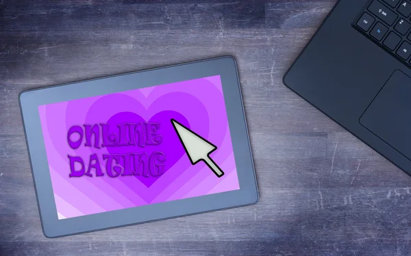 Online dating on a tablet — Stock Photo, Image