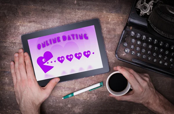 Online dating on a tablet — Stock Photo, Image