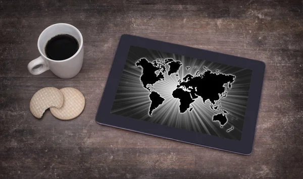 Mapa do mundo em um tablet — Fotografia de Stock