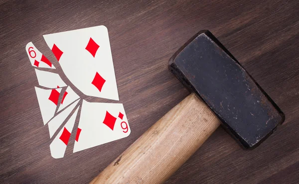 Hammer with a broken card, six of diamonds — Stock Photo, Image