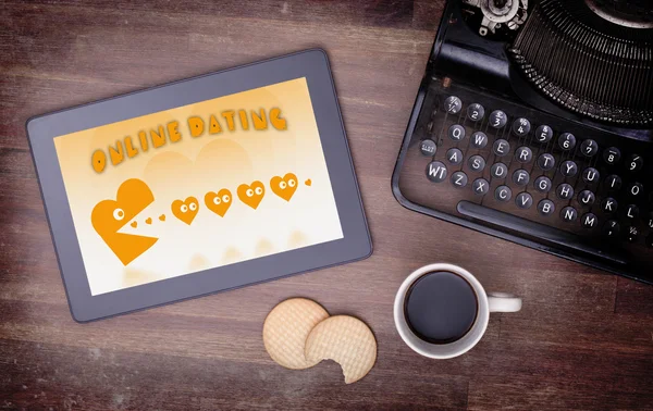 Online dating on a tablet — Stock Photo, Image