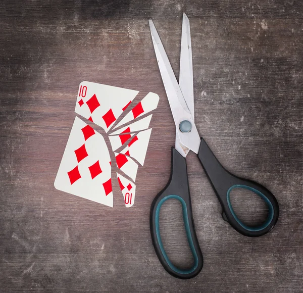 Concept of addiction, card with scissors — Stock Photo, Image