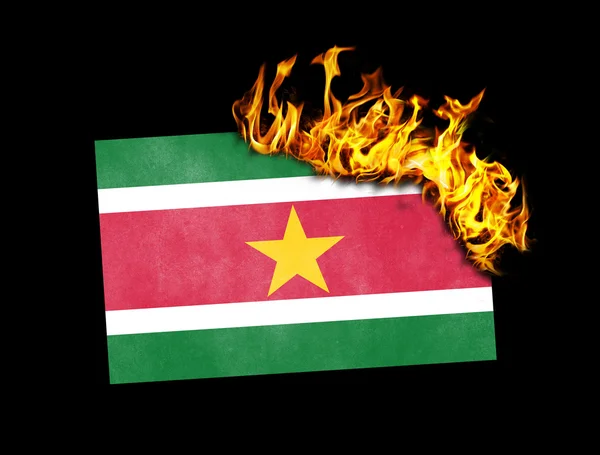 Flag burning - Suriname — Stock Photo, Image