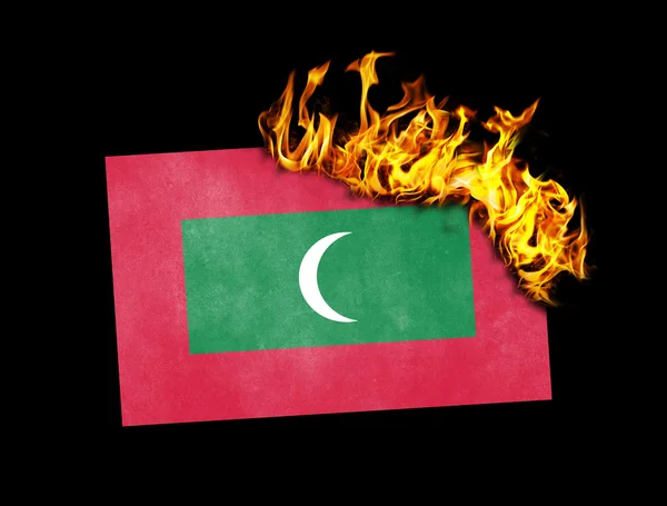 Brûlage du drapeau - Maldives — Photo