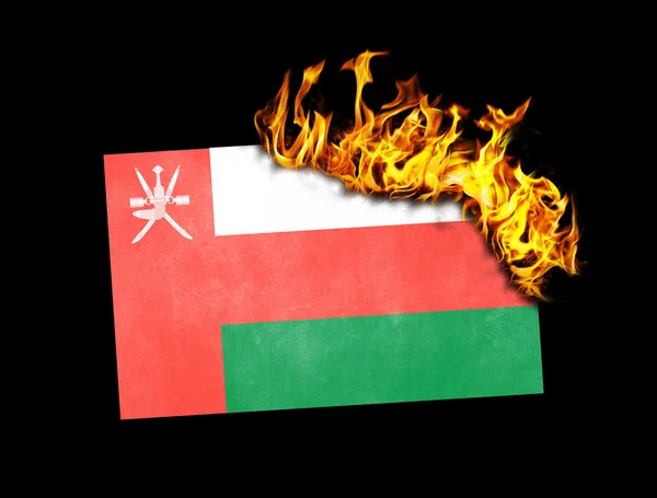 Brûlage du drapeau - Oman — Photo
