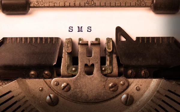Ročník nápis od starý psací stroj — Stock fotografie