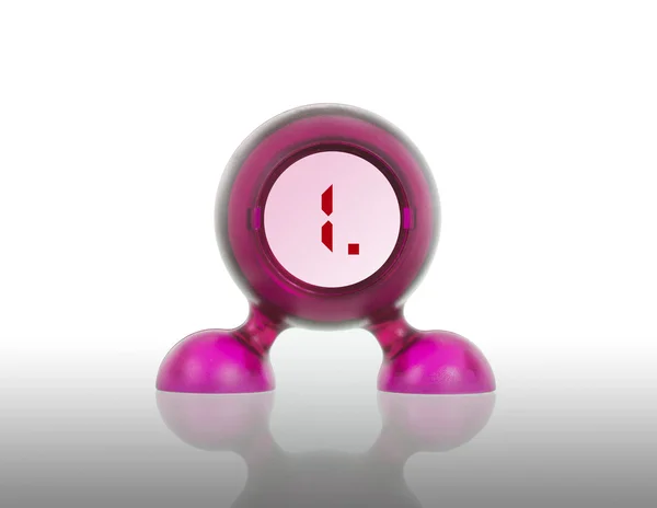Kleine roze plastic object met een digitaal display — Stockfoto