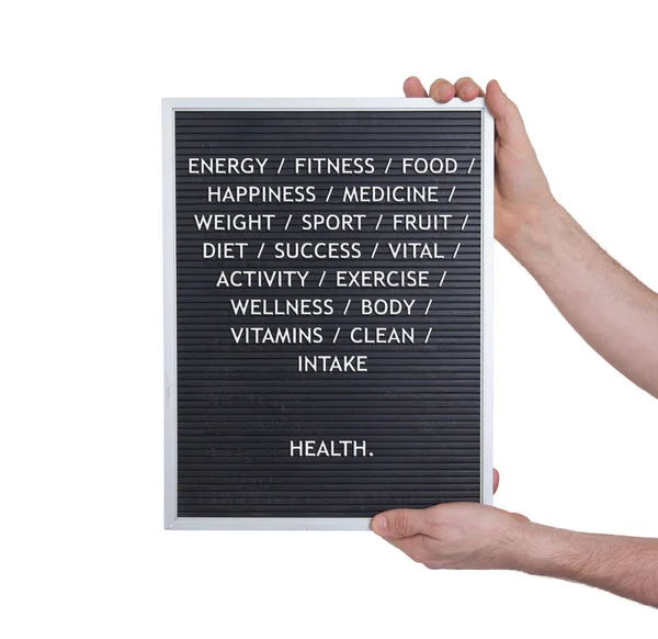 Conceito de saúde em letras plásticas na placa de menu muito antiga — Fotografia de Stock