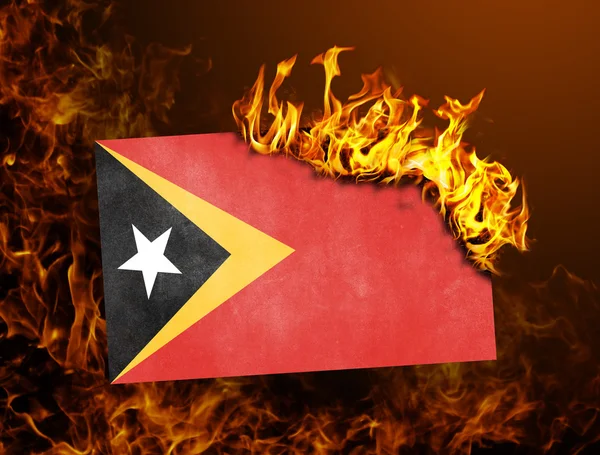 Flaga spalanie - East Timor — Zdjęcie stockowe