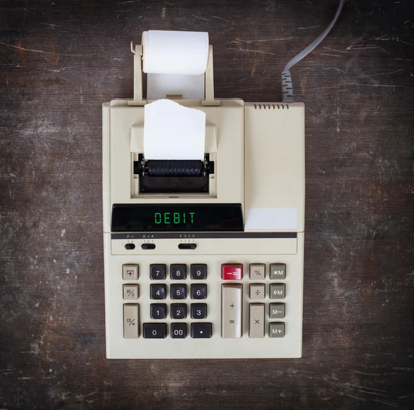 Old calculator - debit — Stock Photo, Image