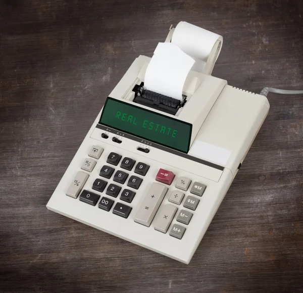 Old calculator - real estate — Stock Photo, Image