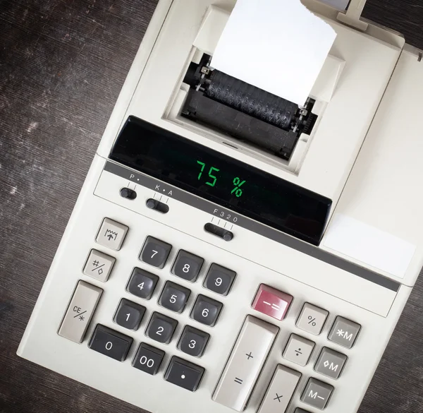 Old calculator showing a percentage - 75 percent — Stock Photo, Image