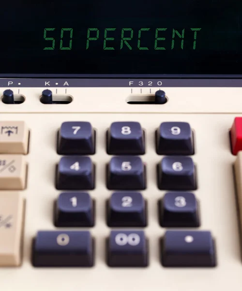 Stary kalkulator Wyświetlono procent - 50 procent — Zdjęcie stockowe