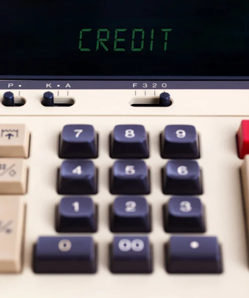 Old calculator showing a text — Stock Photo, Image