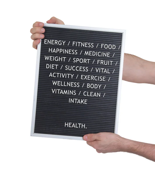 Gezondheid concept in kunststof brieven op zeer oude menu bord — Stockfoto
