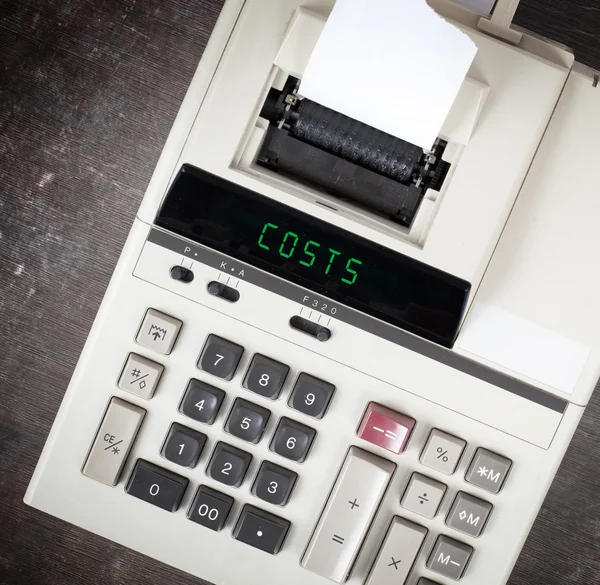 Stary kalkulator - koszty — Zdjęcie stockowe