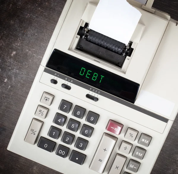 Stary kalkulator - dług — Zdjęcie stockowe