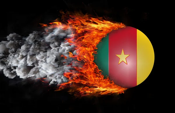 Flag with a trail of fire and smoke - Cameroon — Stock Photo, Image