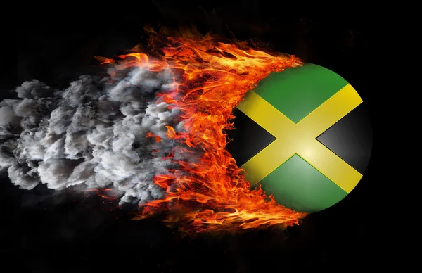Flagge mit einer Spur von Feuer und Rauch - jamaica — Stockfoto