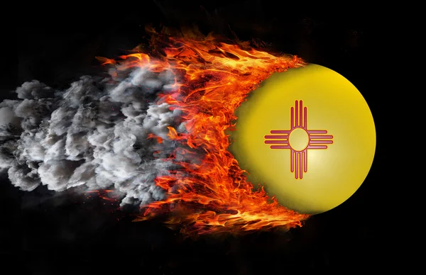 Flag with a trail of fire and smoke - New Mexico — Stock Photo, Image