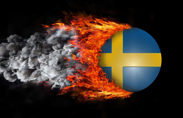 Flag with a trail of fire and smoke - Sweden — Stock Photo, Image