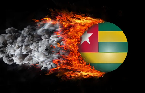 Flag with a trail of fire and smoke - Togo — Stock Photo, Image