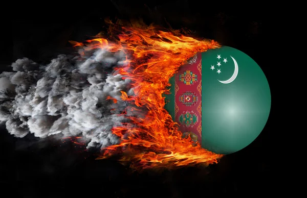 Bandera con un rastro de fuego y humo - Turkmenistán —  Fotos de Stock