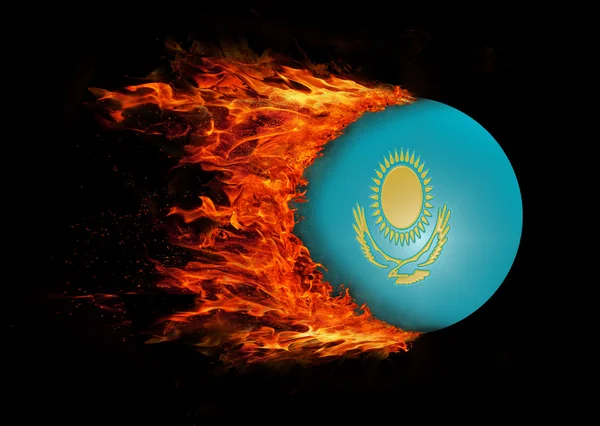Bandera con un rastro de fuego - Kazajstán —  Fotos de Stock