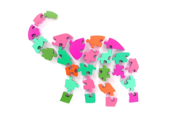 Colorful puzzle pieces in elephant shape — Stock Photo, Image