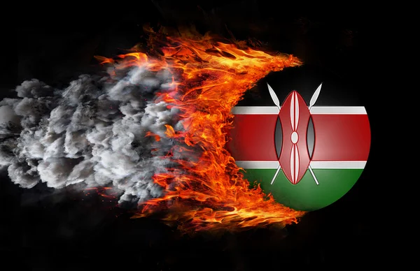 Flag with a trail of fire and smoke - Kenya — Stock Photo, Image