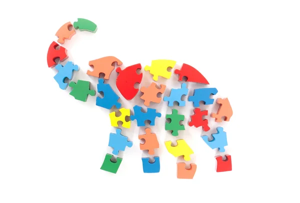 Színes puzzle darab elefánt alakú — Stock Fotó