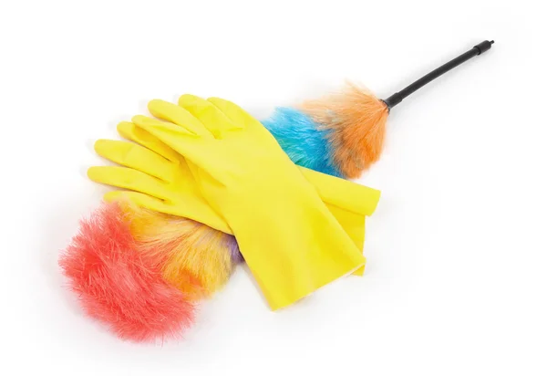 Geel reiniging handschoenen met een stofdoek — Stockfoto