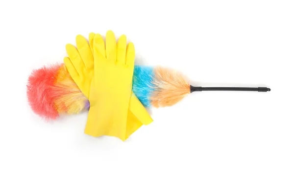 Geel reiniging handschoenen met een stofdoek — Stockfoto