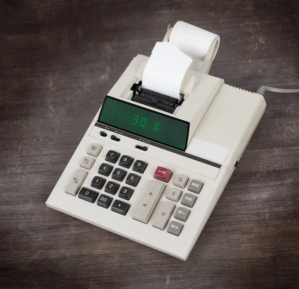 Old calculator showing a percentage - 30 percent — Stock Photo, Image