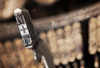 N hammer - old manual typewriter - warm filter
