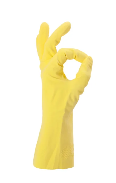 Hand gesturing with yellow cleaning product glove — Stock Photo, Image