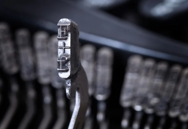 F hammer - old manual typewriter - cold blue filter — Zdjęcie stockowe