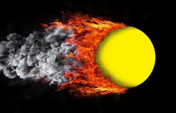 Ball with a trail of fire and smoke - yellow — Stock Photo, Image