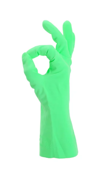 Hand gesturing with green cleaning product glove — Stock Photo, Image