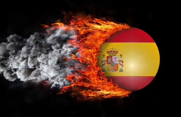 Flag with a trail of fire and smoke - Spain — 图库照片