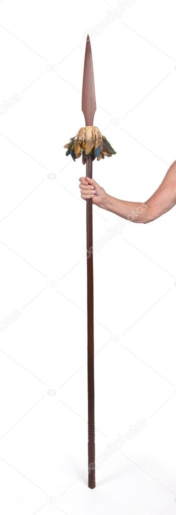 Old hand hodling an old wooden spear