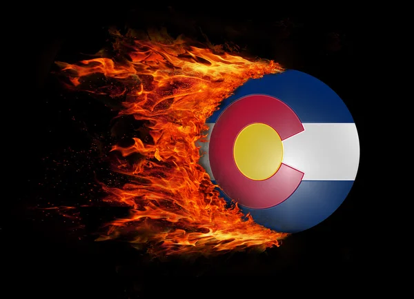 US state flag with a trail of fire - Colorado — Stock Photo, Image