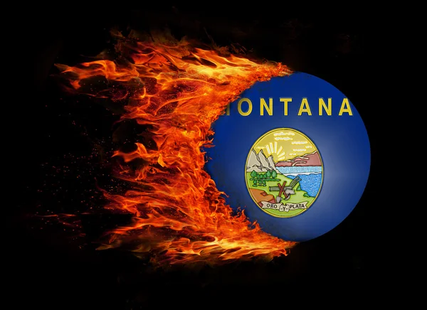 Bandera del estado de Estados Unidos con un rastro de fuego - Montana —  Fotos de Stock
