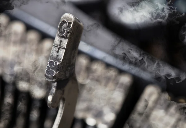 G hammer - old manual typewriter - mystery smoke — Stock Photo, Image